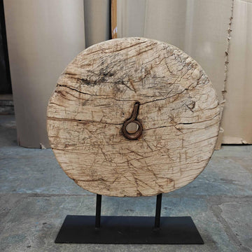 Handcrafted wooden wheel display on stand antique rustic decorative artifact