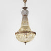 Antique brass Empire chandelier with hand-cut beveled crystal glass and vintage patina finish for elegant classic and traditional interiors