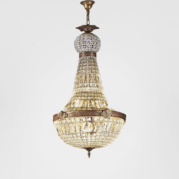 Antique brass Empire chandelier with hand-cut beveled crystal glass and vintage patina finish for elegant classic and traditional interiors