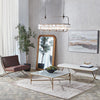 Montreal Long chandelier crafted from solid brass with antique brass finish and clear glass shades for dining rooms and modern interiors