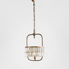 Toronto chandelier crafted from solid brass with curved gold cage design and adjustable chain for modern dining rooms and statement interiors