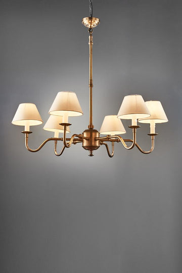 Prescot 6-arm antique brass chandelier with solid brass frame and adjustable height for classic dining rooms and traditional interiors