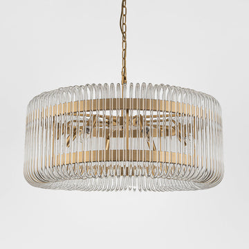 Alpine chandelier with clear glass loops and brass-finished iron frame creating an elegant statement light for dining rooms and luxury interiors