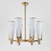 St. Germain chandelier with brass-finished iron frame and six frosted tapered glass shades for elegant living and commercial spaces