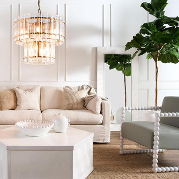 Fenton two-tier chandelier with textured clear crystals and brass-finished iron frame for luxury living rooms and commercial interiors