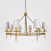 Brushed brass Waterloo chandelier with linen lampshades for warm ambient home lighting