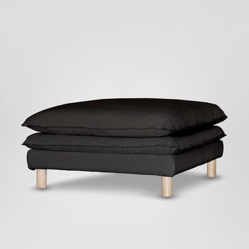 Contemporary charcoal ottoman with removable washable Belgian linen cover and deep cushioned seat for designer home interiors