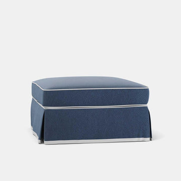 Noosa Hamptons navy upholstered ottoman with white piping cotton fabric cushioned seat and timber legs for coastal style living room seating