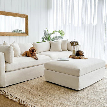 Marbella ivory upholstered ottoman with premium textured fabric and timber legs for contemporary living room seating