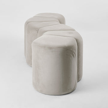 Contemporary ridge bench ottoman in dune velvet fabric with unique S shaped design for lounge and seating spaces