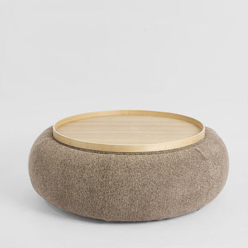 Modern storage ottoman coffee table in oak and brown with cushioned top and hidden internal storage space