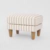 Hamptons style upholstered ottoman in natural stripe fabric with timber legs for relaxed coastal interiors