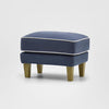 Bondi navy fabric ottoman with contrast white piping and timber legs for elegant coastal living room furniture
