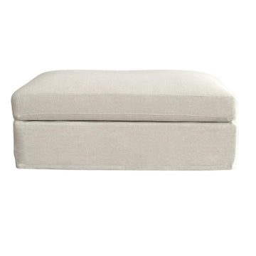 Marbella modular ottoman base with soft upholstered cushion and wooden spindle legs for contemporary living spaces