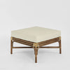 Handcrafted Dynasty rattan ottoman with white linen cushion and Chippendale style detailing for luxury coastal interiors