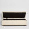 Luxury bedroom storage ottoman in beige fabric with tufted cushion top and hidden internal storage space