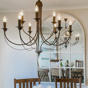 Statement 9 light ceiling chandelier with flowing iron design for sophisticated homes