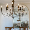 Statement 9 light ceiling chandelier with flowing iron design for sophisticated homes