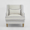 Hamptons style slipcover sofa with tailored piping, loose cushions, and neutral upholstery for contemporary interiors