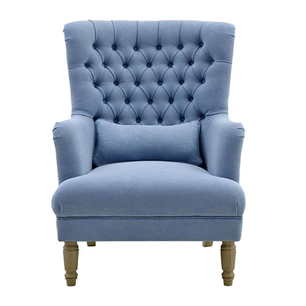 Bayside wingback armchair in slate blue fabric with button tufting, high backrest, and wooden legs