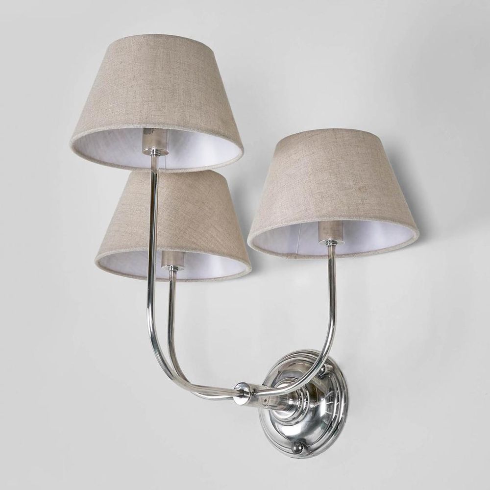 Trilogy Wall Lamp Victorian three-arm wall light in antique brass or silver – traditional candle-style sconce with cream sleeves for heritage interiors