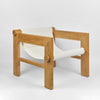 Rustic coastal accent chair with natural wood structure and white sling upholstery