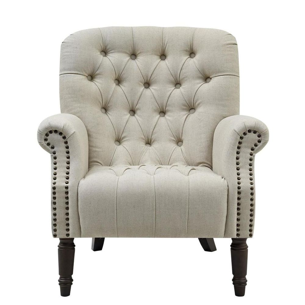Timeless living room armchair with tufted design, neutral linen fabric, and elegant detailing