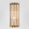 Medium Kobe Wall Light brass-finished base with six vertical glass rods – elegant semicircular wall sconce for bathrooms, bedrooms, and modern interiors