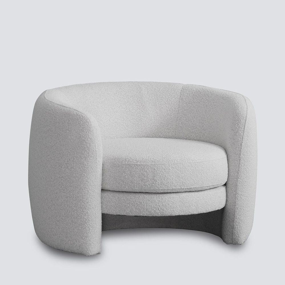 Cora curved armchair in vanilla boucle with high back circular design for modern living room seating