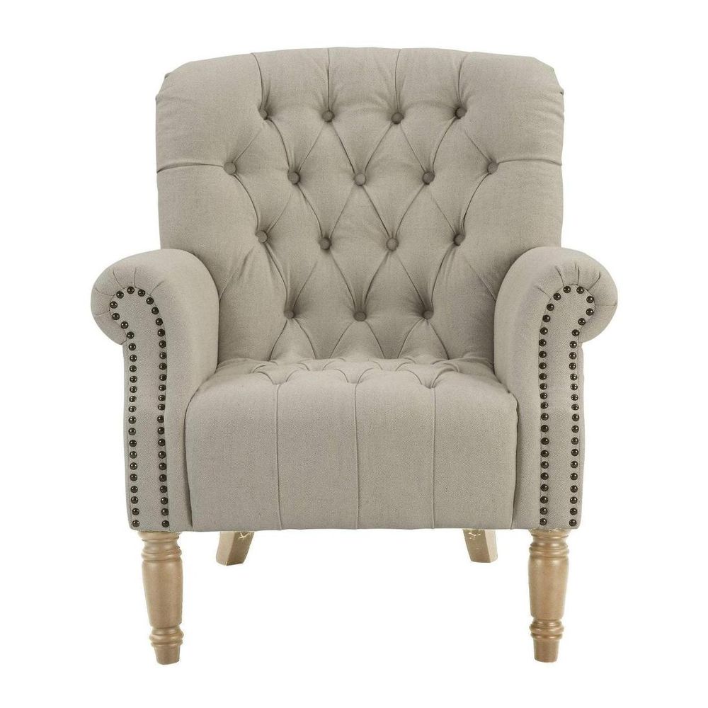 Natural linen buttoned armchair with rolled arms, tufted backrest, stud detailing, and solid oak legs