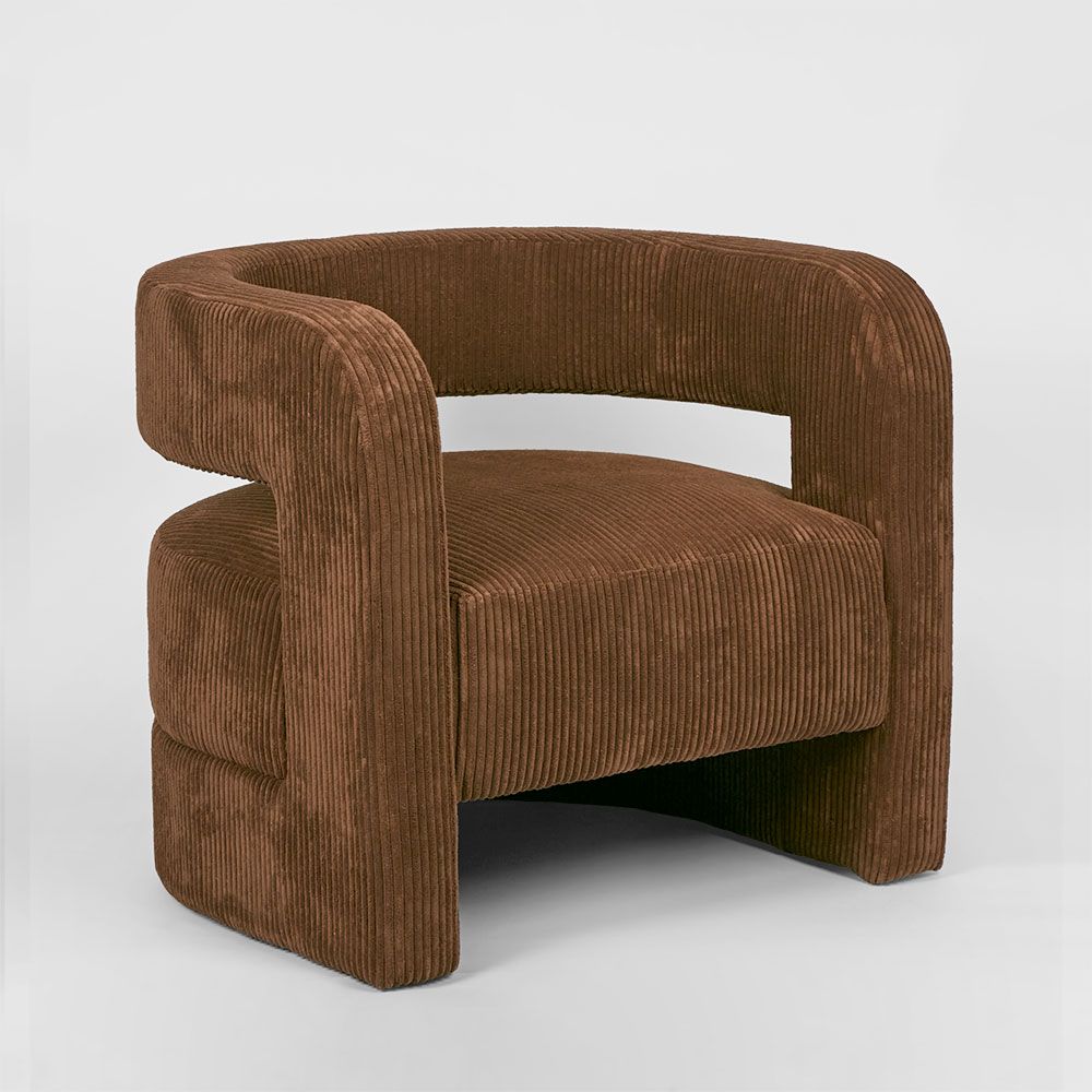 Contemporary Cleo armchair with enclosed armrests and deep seating for living room or bedroom use