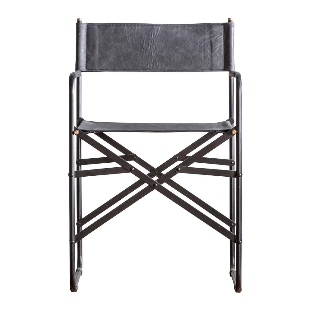 Jodhpur folding chair set with leather seat, black metal frame, and brass accents in modern industrial design