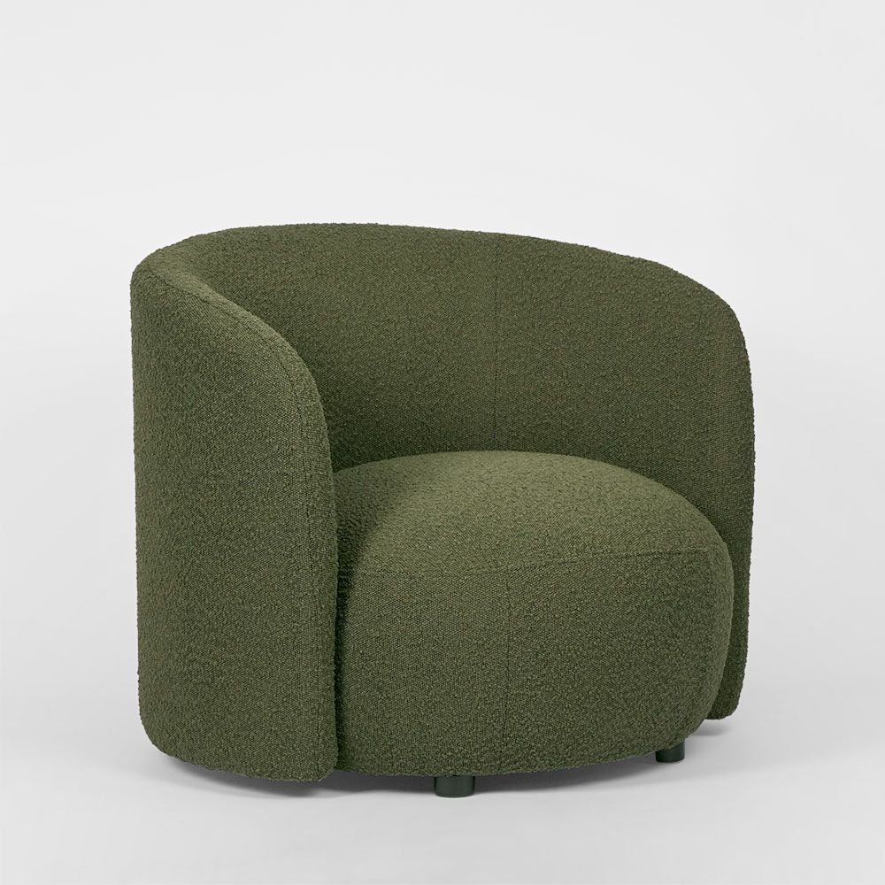 Plume curved armchair in boucle fabric with compact circular design for modern living room seating