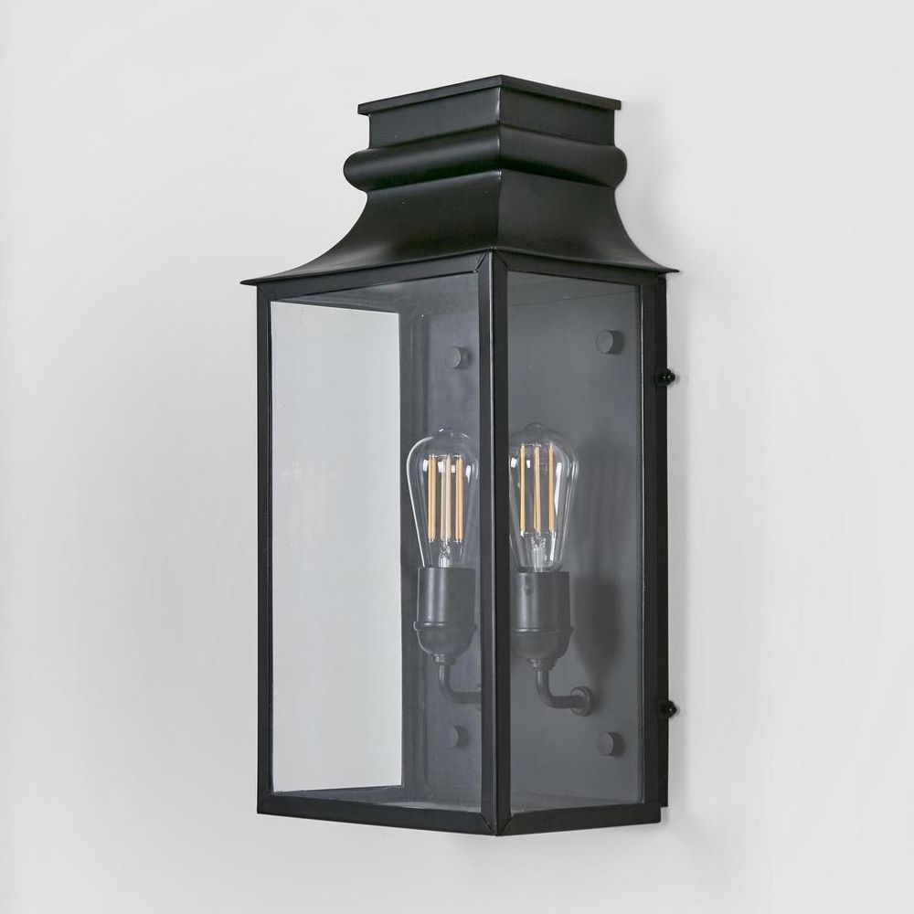Westpoint Outdoor Wall Light solid brass with clear glass panels and antique brass finish – elegant outdoor wall sconce for hallways, entrances, patios, and exterior walls