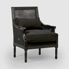 Hicks black armchair with hand carved solid oak frame, ornate detailing, and cushioned upholstered seat