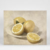 Lemons on White Plate wall art featuring a vibrant citrus still life with lemons on a white plate in bright tones, framed artwork 40 x 50 cm