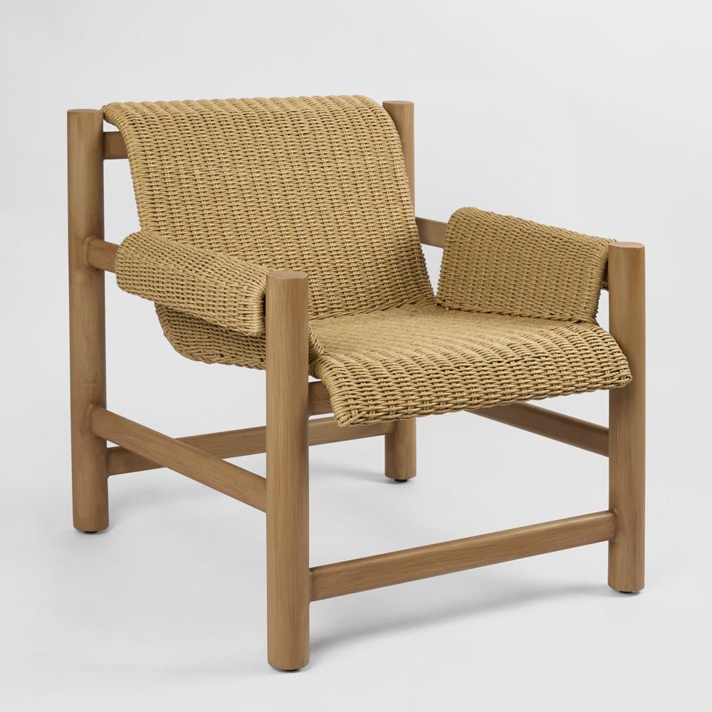 Riven outdoor occasional chair with aluminium wood effect frame and hand woven UV resistant wicker seating for patio and garden