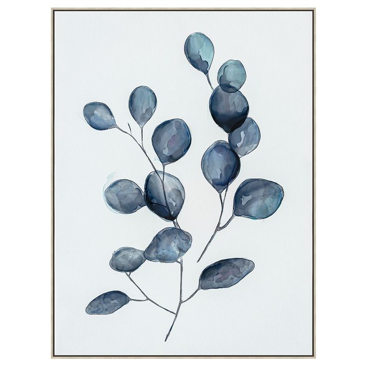 Botanical leaf wall art in striking blue tones printed on canvas with pine frame.