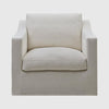Elegant Hamptons style upholstered armchair with soft slipcover, comfortable cushions, and traditional coastal-inspired design