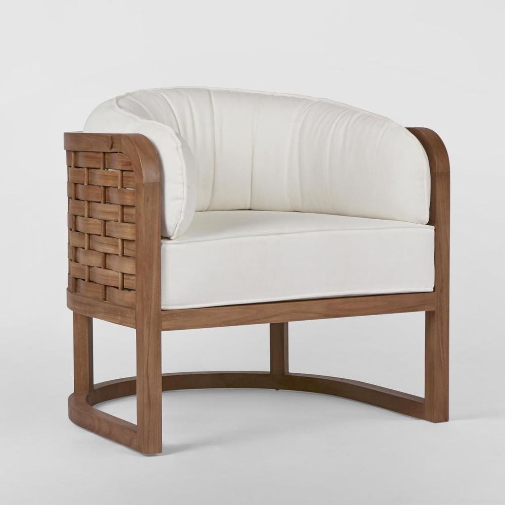 Weave teak armchair with handwoven detailing, solid teak frame, and outdoor cushions for indoor and outdoor use