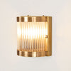 Pretoria Outdoor Wall Light with antique brass backplate and clear glass shade – classic outdoor wall sconce for entryways, verandas, and garden walls