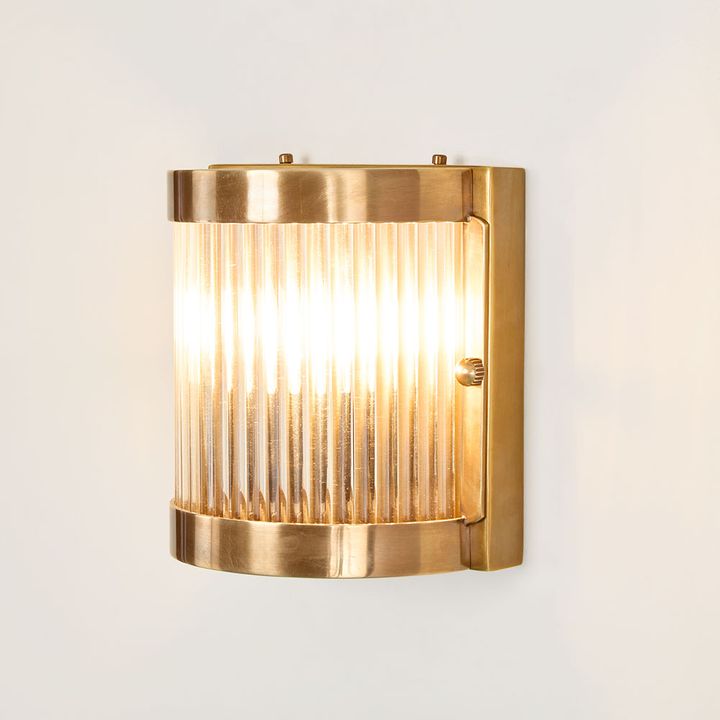 Pretoria Outdoor Wall Light with antique brass backplate and clear glass shade – classic outdoor wall sconce for entryways, verandas, and garden walls