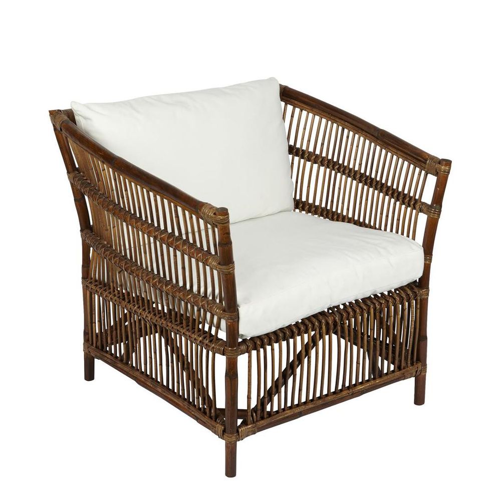 French style rattan armchair with scalloped edges and natural wicker handwoven construction