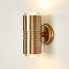 Primrose Outdoor Light in solid brass and glass – modern minimalist wall light with dual-beam illumination for entryways, patios, and interiors