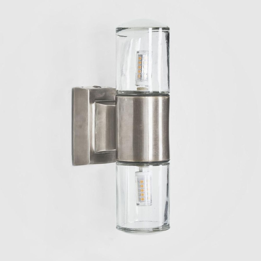 Plover Outdoor Wall Light in antique silver – elegant brass and glass outdoor wall sconce for entryways, patios, and hallways