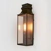Westpoint Outdoor Wall Light solid brass with clear glass panels and antique brass finish – timeless outdoor wall sconce for entryways, hallways, patios, and exterior walls