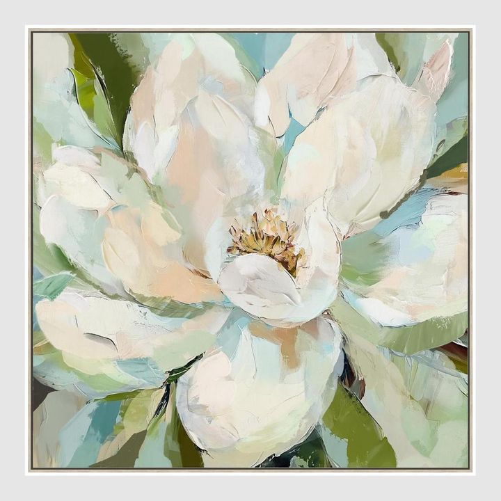 Radiant Bloom magnolia floral canvas artwork with creamy white petals, golden tones, and verdant green accents.