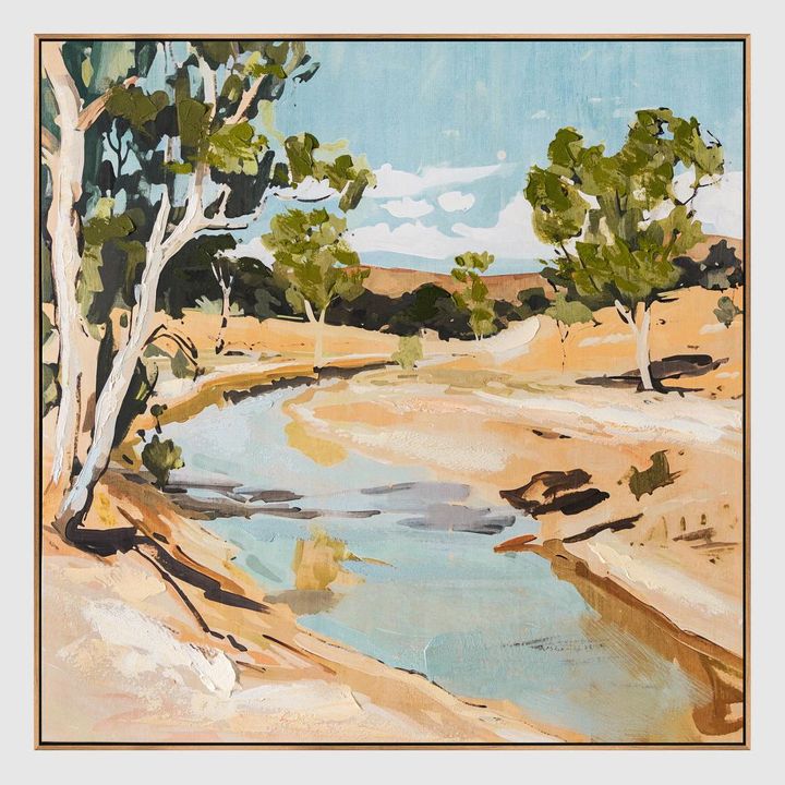 Calming creek wall art with scenic water and tree landscape in natural earthy colors.