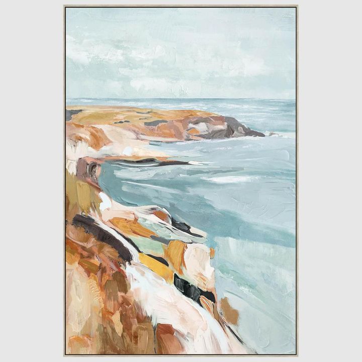 Coastal wall art with sailboat and water scene in calming blue and neutral tones for home décor