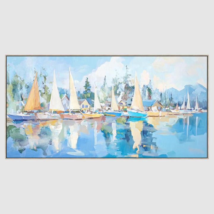 Coastal sailing wall art with sailboats and tranquil ocean view in soft blue tones